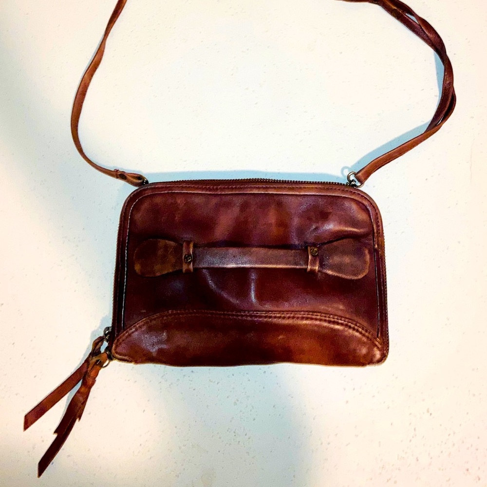 Leather clutch with removable strap